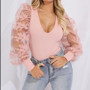 PrettyLittleThing Blush Pink Ribbed Plunge Bodysuit